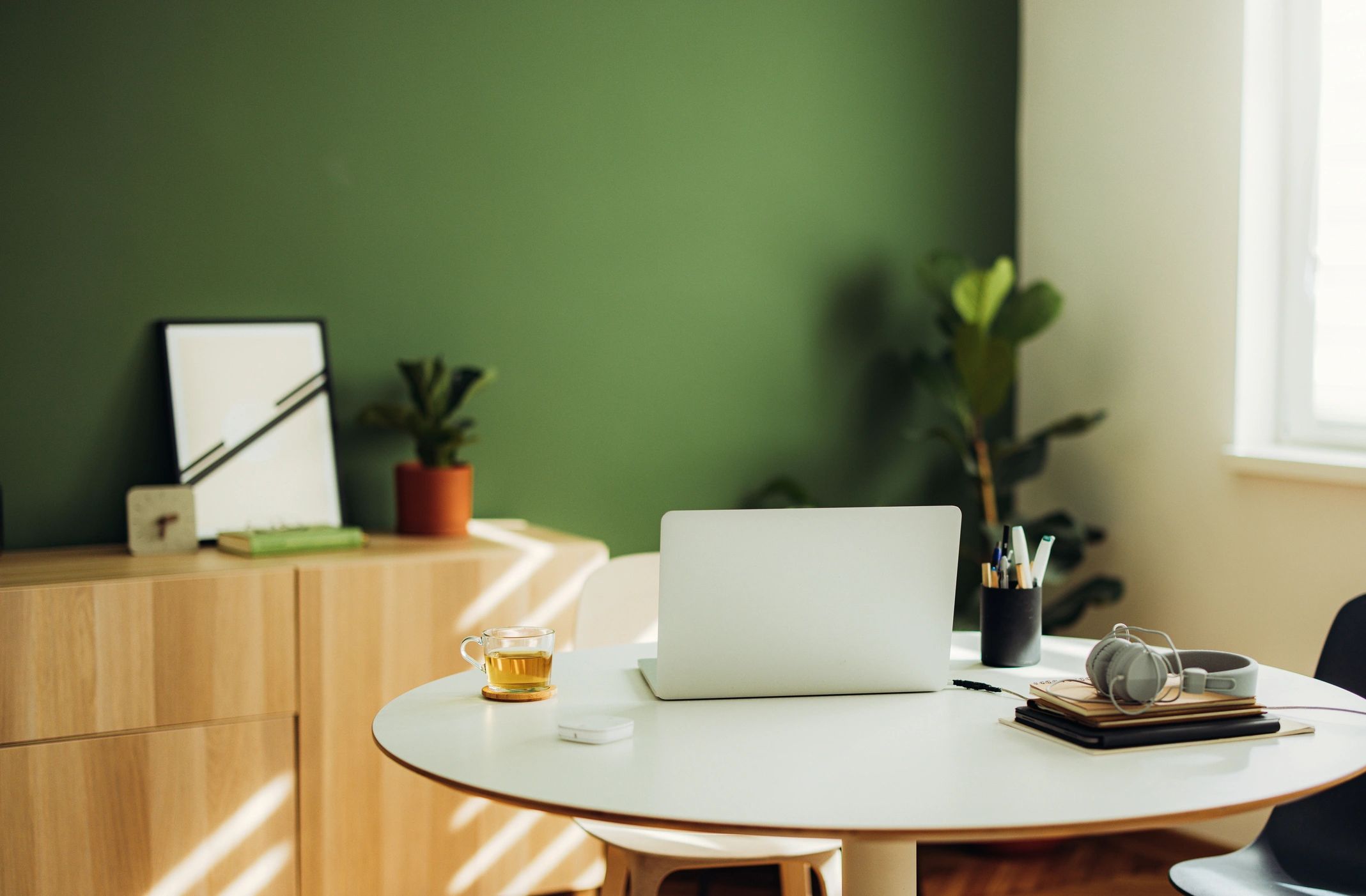 Minimal branding design desk with laptop and notebook